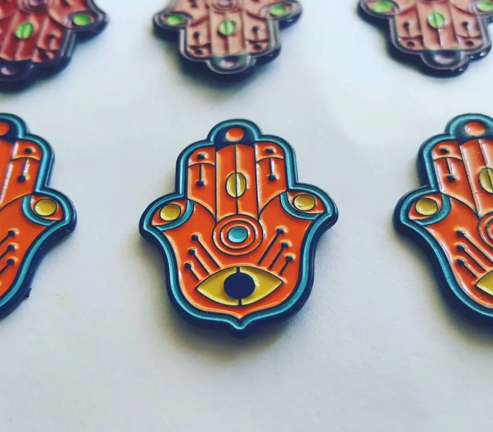 Hamsa Pin – Orange, Light Blue, Yellow, and Navy